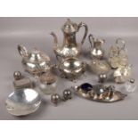 A box of silver plate to include coffee pot, teapot, cream jug, cruet sets etc.