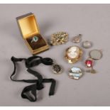 A quantity of jewellery, to include Victorian brooches, lockets, two silver rings, New York World'