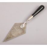 A white metal masonic trowel, engraved Lodge Unity (Bengal) at Nazica on the 30th of MAY 1919.