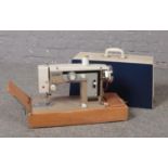 Cased New Home sewing machine, model No 675