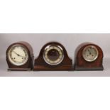 Three oak cased mantel clocks, to include Smith example.