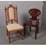 A carved Victorian Gillows style hall chair, with shell motif backrest, along with a carved oak