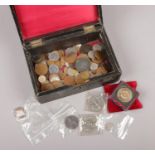 A box of British and foreign pre-decimal coins to include three pence, pennies, commemorative crowns