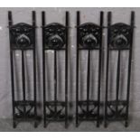 A set of 4 ornate art nouveau painted cast iron balustrades.