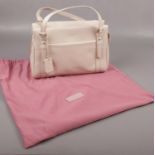 A Radley Chelsea small zip top grab bag, with dust cover and tags on