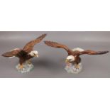 A pair of Beswick eagles, model number 1018. Chip to wing of one eagle.