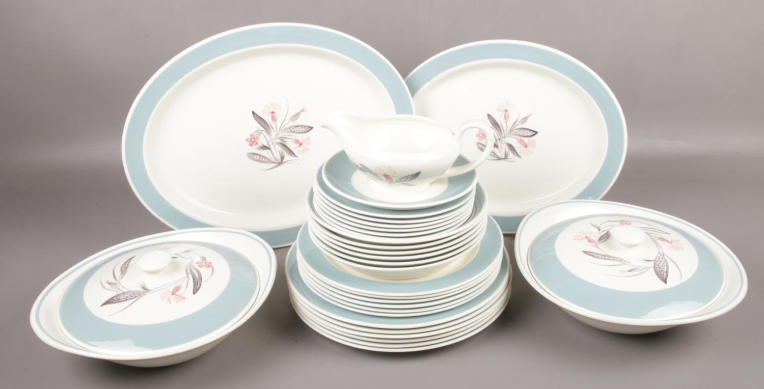 A quantity of Susie Cooper dinnerwares in the Pink Campion design to include tureens, plates, jug
