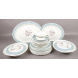 A quantity of Susie Cooper dinnerwares in the Pink Campion design to include tureens, plates, jug