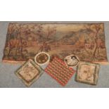 A collection of machine and hand woven tapestries. Including two lace edged antique examples and a
