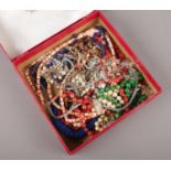 A box of costume jewellery beads.