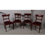 A set of eight mahogany dining chairs, to include two carvers, raised on reeded supports.