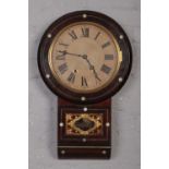 A 19th century inlaid rosewood drop dial 8 day wall clock.