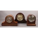 A large mahogany Westminster chime mantel clock, along with two oak cased mantel clocks.