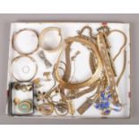 A collection of gilt metal costume jewellery, to include brooches, bracelets, cufflinks etc.