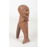 An early 20th century Continental carved wood nut cracker formed as an old woman, 21.25cm. Good