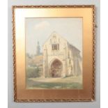 Gilt framed watercolour, architectural study. Gatehouse and figure, signed indistinct and dated