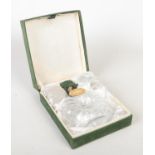 A Baccarat crystal decanter for Remy Martin Fine Champagne Cognac in green velvet mounted box.