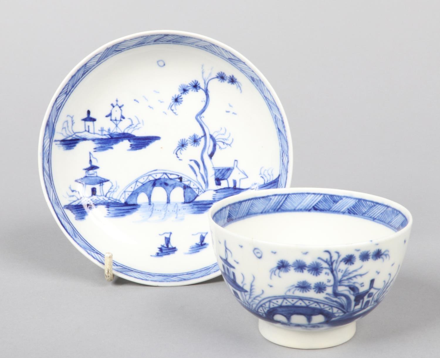 a Caughley teabowl and saucer. Painted in underglaze blue with the Bridge and Windmill pattern c. - Image 2 of 6