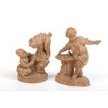 A pair of late 19th century French small terracotta sculptures. One of a young boy posing as a