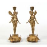 A pair of late 19th century French gilt bronze figural candlestick formed as winged fairies. Each