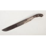 A 19th century Sinhalese dagger. With carved hardwood grip and embellished in gold and silver, 31cm.