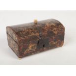 A 19th century dome topped casket with faux tortoiseshell decoration Having bone knop and feet and