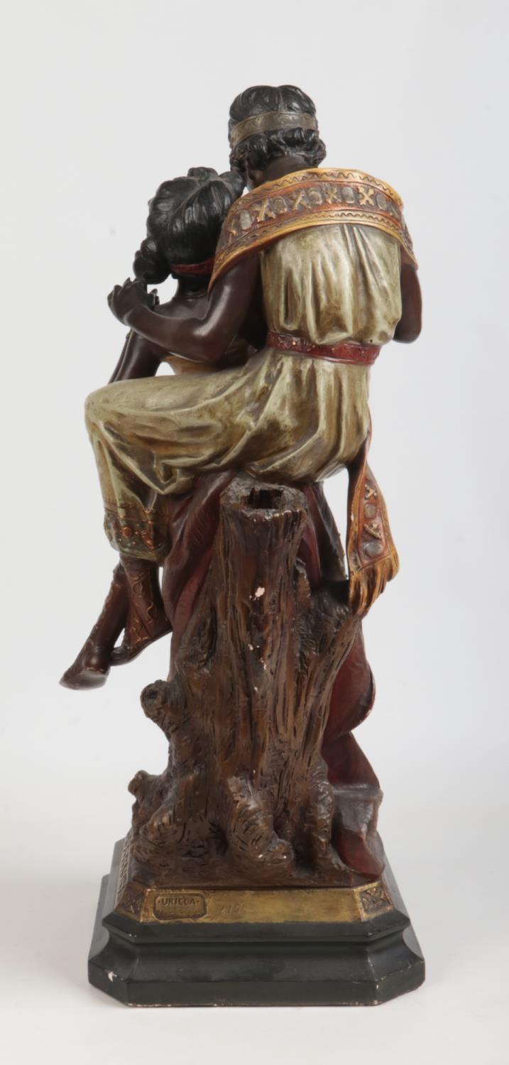 A large Art Nouveau painted terracotta figure group. Odalisque and companion. Raised on a canted - Image 3 of 4