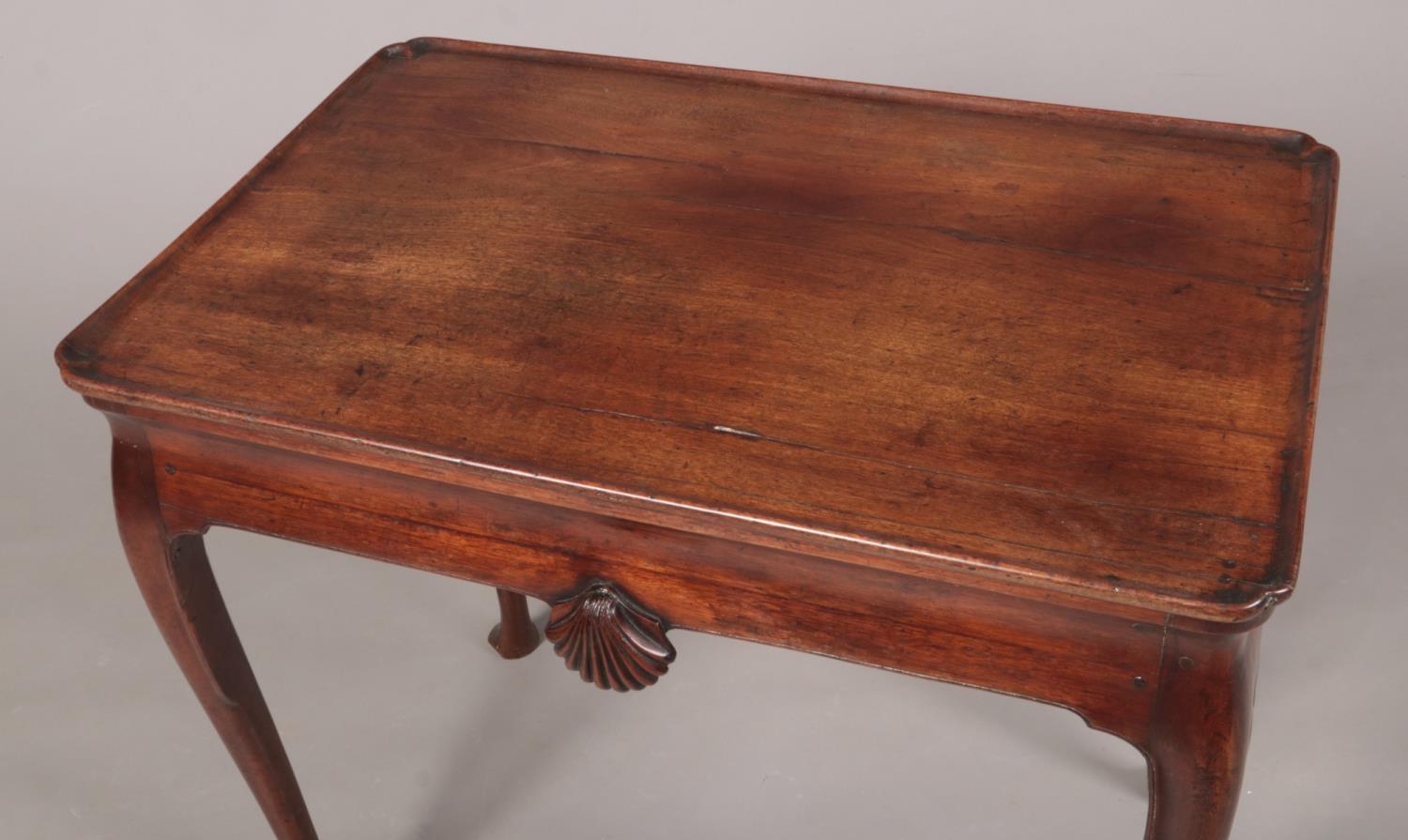 A George II Irish mahogany silver table with notched rectangular dish top. With a pair of carved - Image 3 of 8