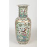 A large 19th century Cantonese rouleau vase. Painted with a ground of flowers, birds, butterflies