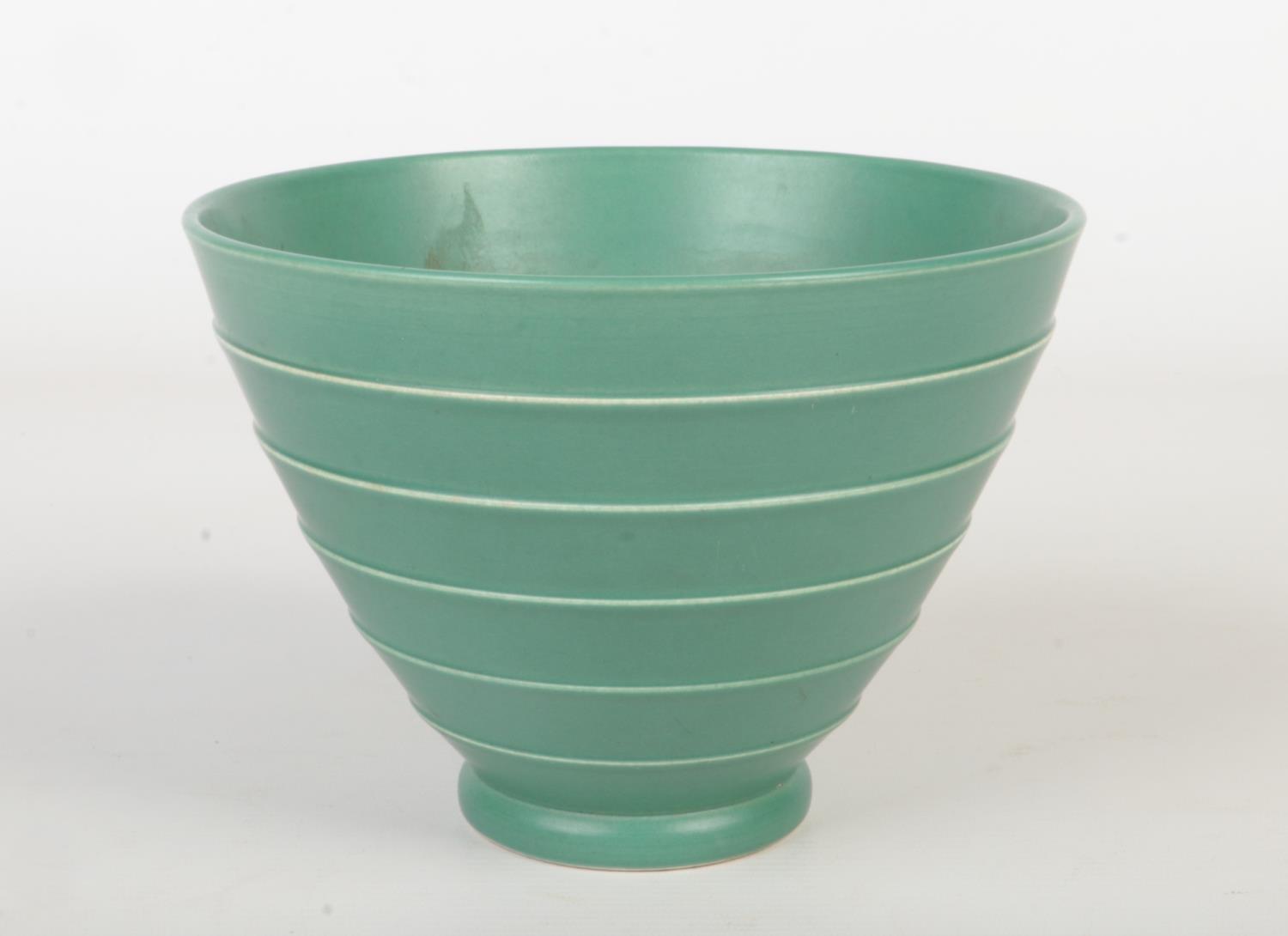 A Wedgwood Art Deco conical bowl designed by Keith Murray. Green glazed and moulded with