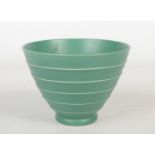 A Wedgwood Art Deco conical bowl designed by Keith Murray. Green glazed and moulded with