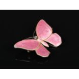 A silver and enamel butterfly brooch by Child & Child, with gold pin, hinge and C hook. With rough