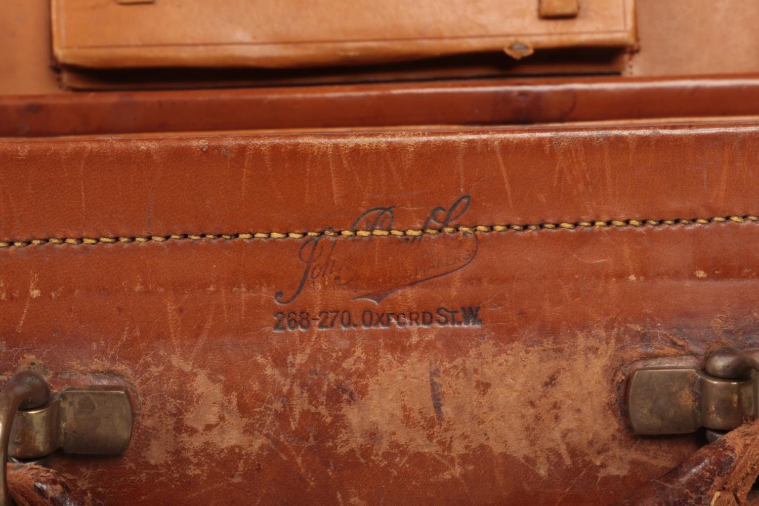 A vintage tan leather fitted vanity case monogramed M. F. along with a quantity of sport / hunting - Image 3 of 3