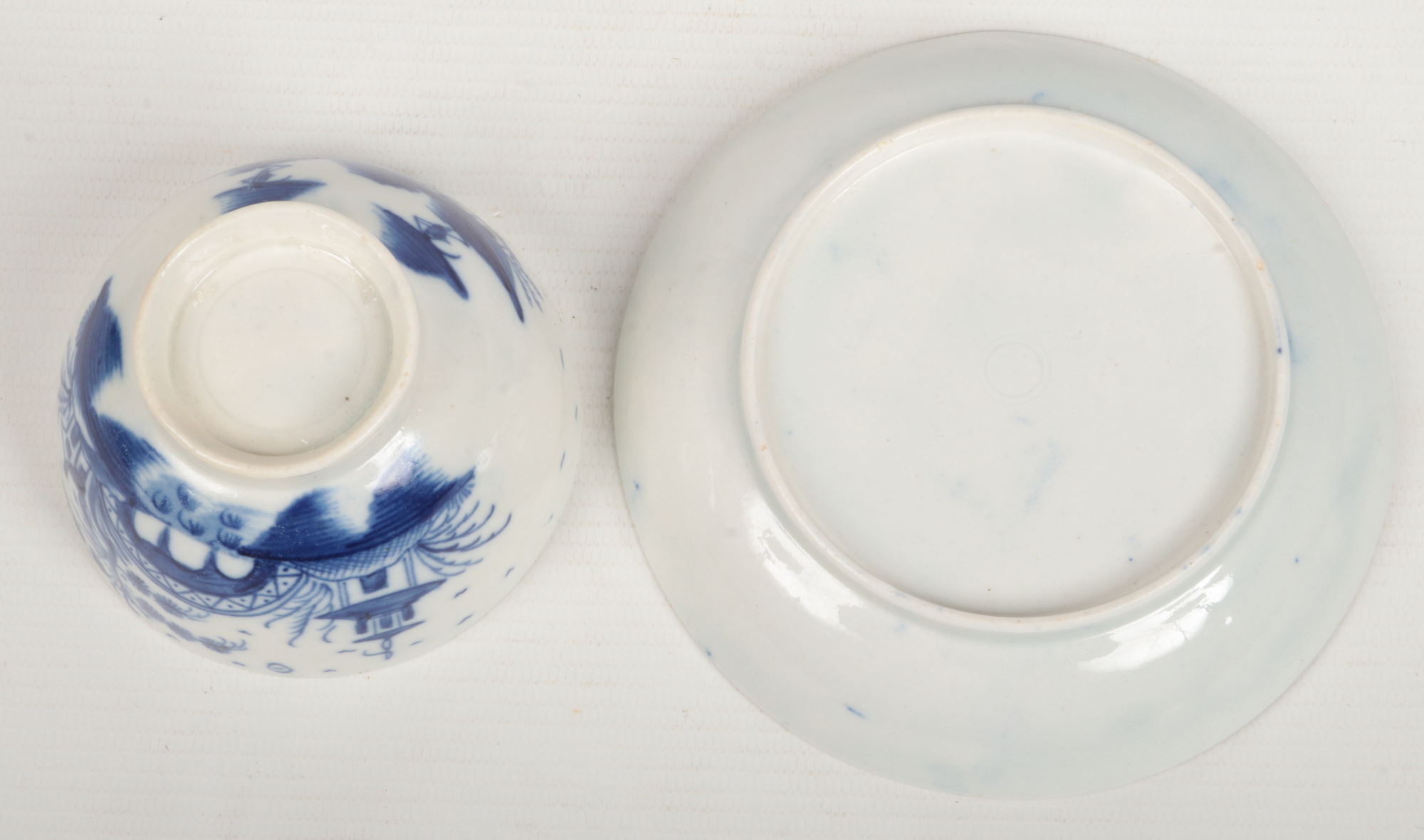 a Caughley teabowl and saucer. Painted in underglaze blue with the Bridge and Windmill pattern c. - Image 3 of 6