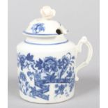 A Caughley mustard pot and cover with flower finial and moulded double scrolling handle. Printed