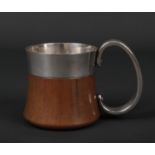 A Georg Jensen Design taverna pattern mug by Henning Koppel. With bulbous copper base and silver C-