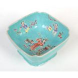 A Chinese Daoguang (1821-1850) square bowl with reeded corners. Turquoise ground and finely