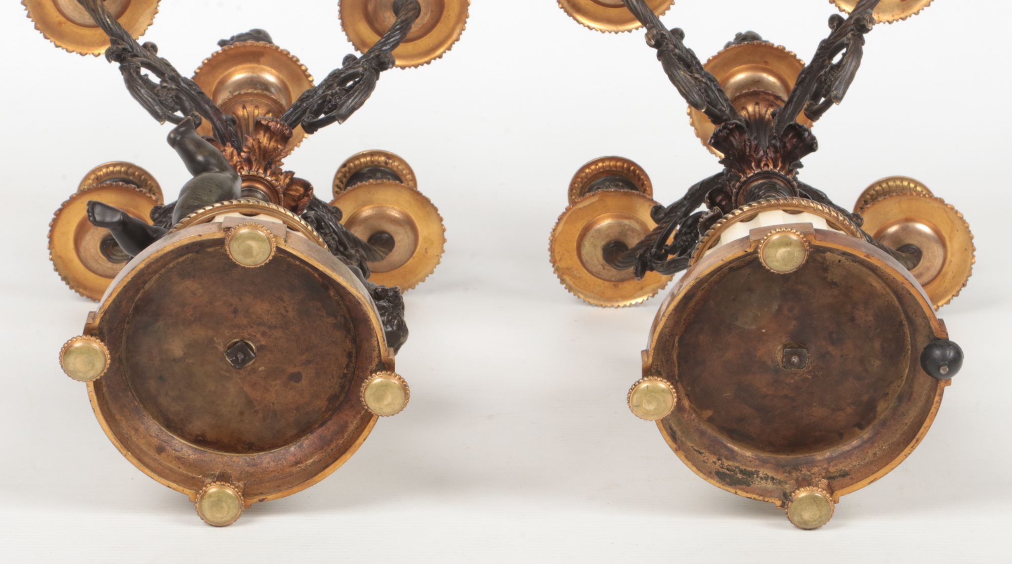 A pair of 19th century French parcel gilt bronze and marble five branch candelabra raised on flatted - Image 9 of 11