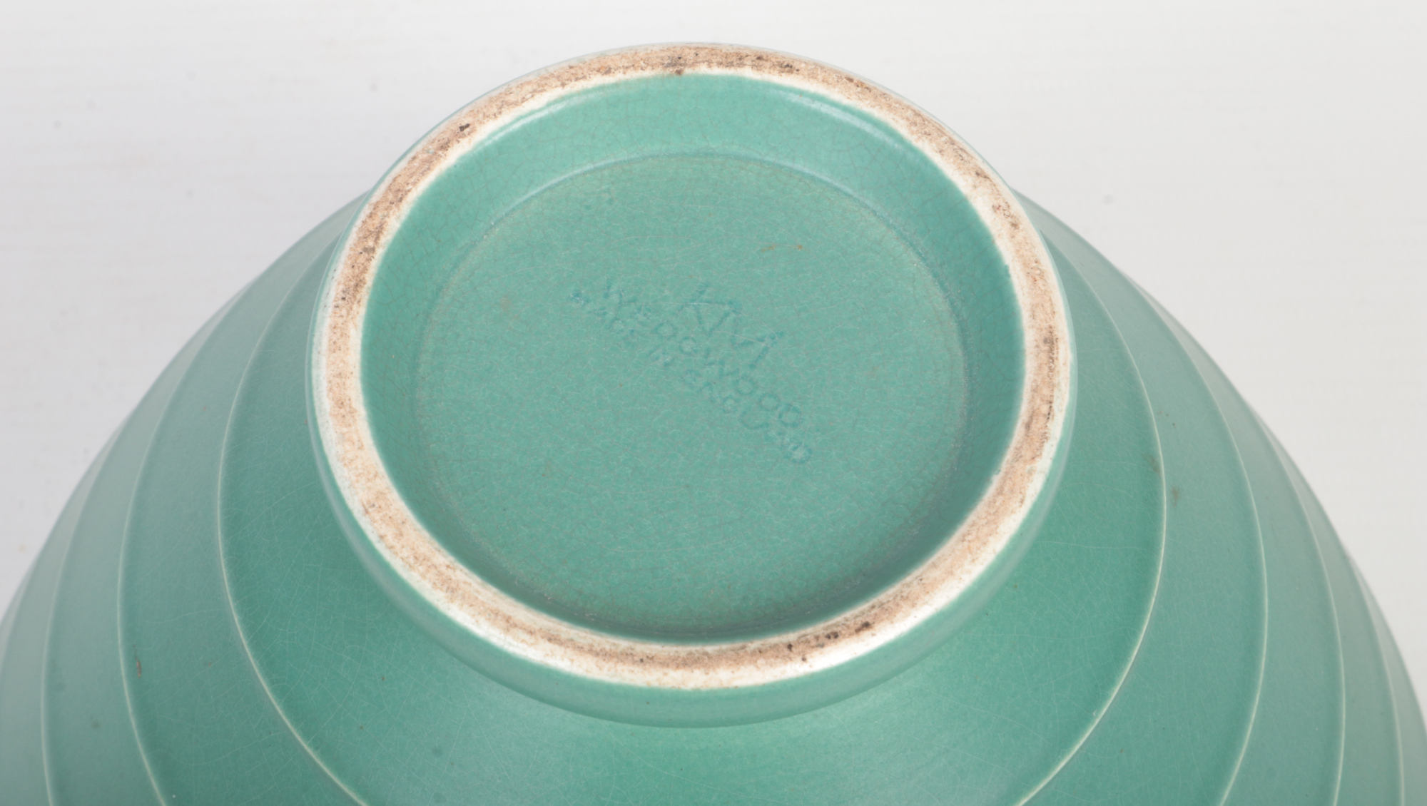 A Wedgwood Art Deco conical bowl designed by Keith Murray. Green glazed and moulded with - Image 3 of 4