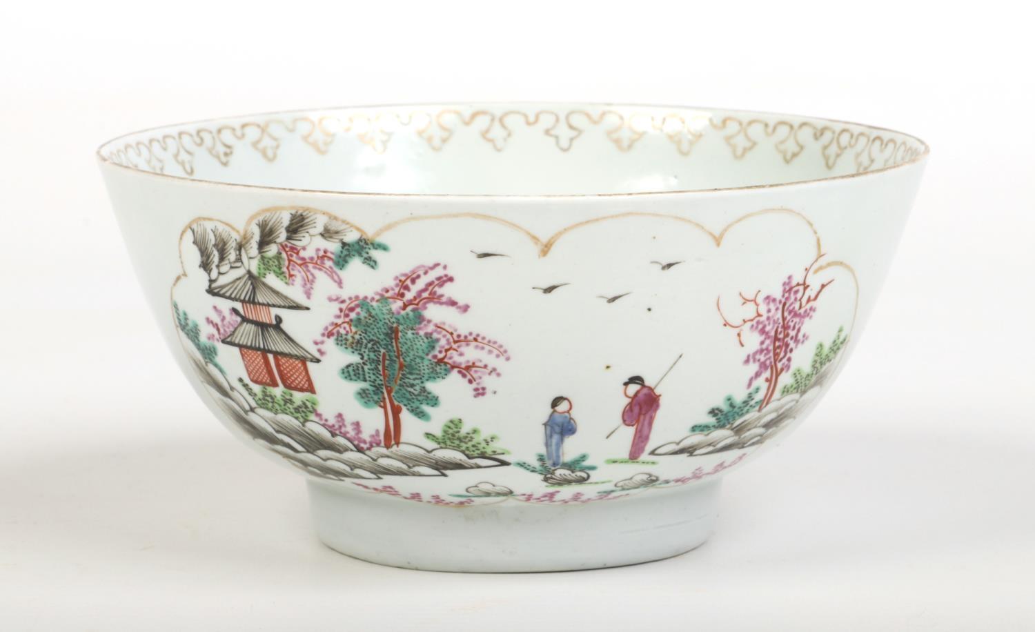 A Worcester bowl. Painted with two landscapes in fluted cartouches, the so called Stag Hunt pattern.