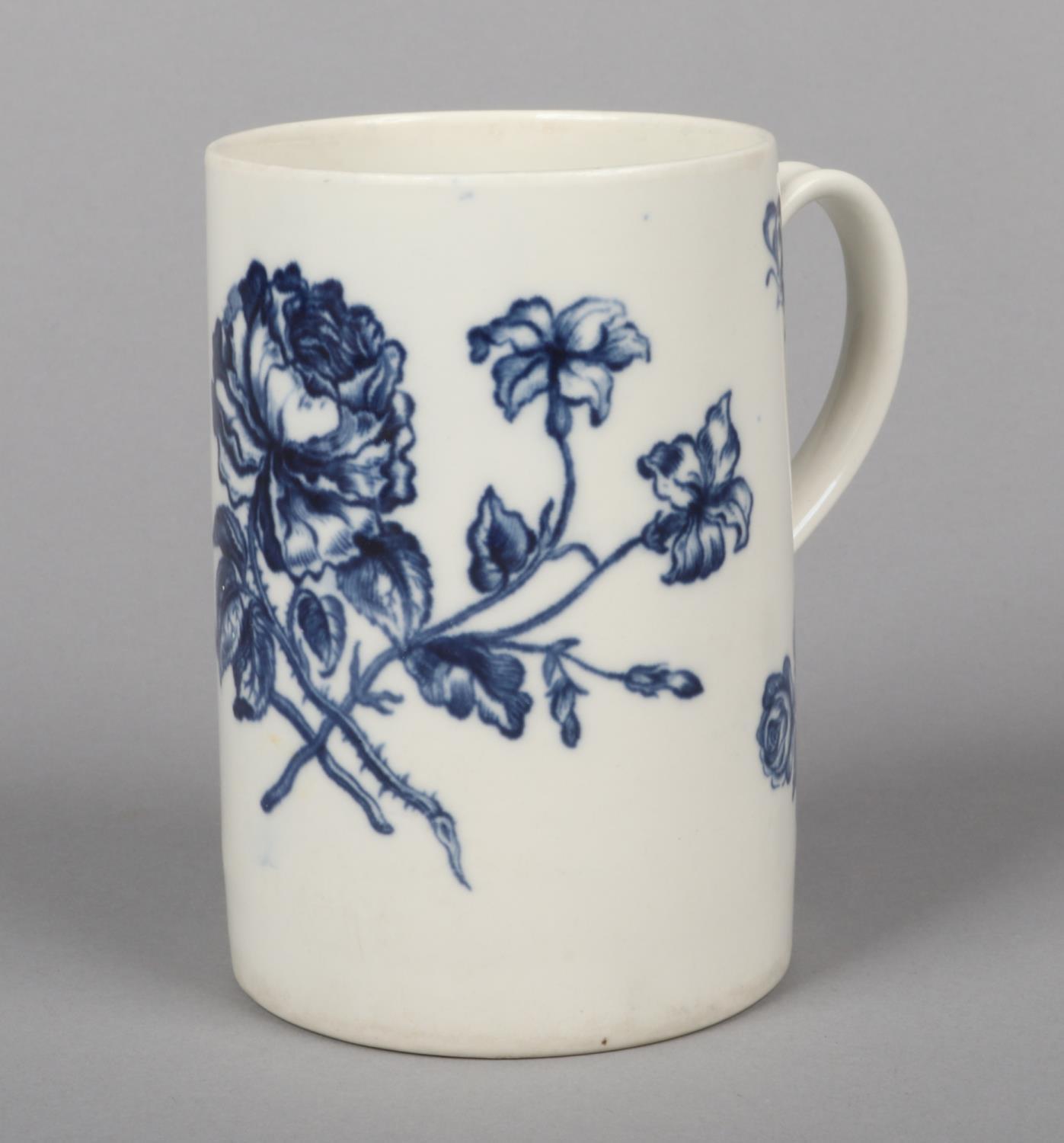 A rare Caughley cylindrical mug with grooved strap handle. Printed in underglaze blue with the