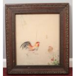 A Chinese late 19th / early 20th century silk embroidered picture in associated frame. Study of a