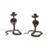 A pair of Indian bronze Bidriware candlesticks formed as cobra, 20cm. No breaks or repairs. Nice