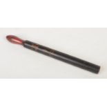 A George IV turned and painted truncheon. With red handle but predominantly black ground, having