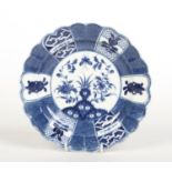 A Caughley uncommon lobed plate. Painted in underglaze blue with the Scholar's Rock pattern. C