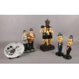 A group of Laurel & Hardy ceramic figures, 'No smoking' with smoking Laurel & Hardy, In Bathing