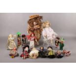 A box of pot dolls and dolls dressed in national costumes to include, a standing pot doll dressed in