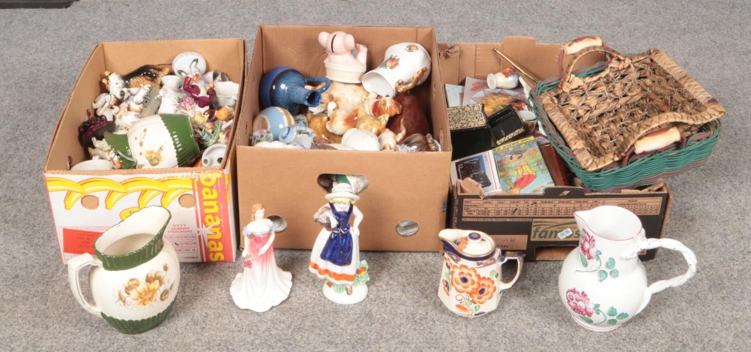 Three boxes of miscellaneous, figurines, jugs, place mats etc