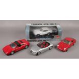 A collection of 1:18 scale diecast model cars, to include boxed Sun Star example, Maisto, Burago