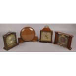 Three Tempora mantel clocks along with another similar mantel clock.